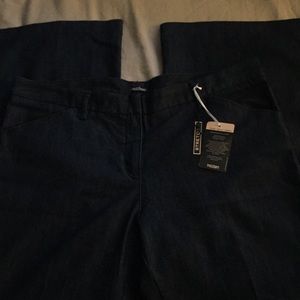 Dark bootcut blue jeans